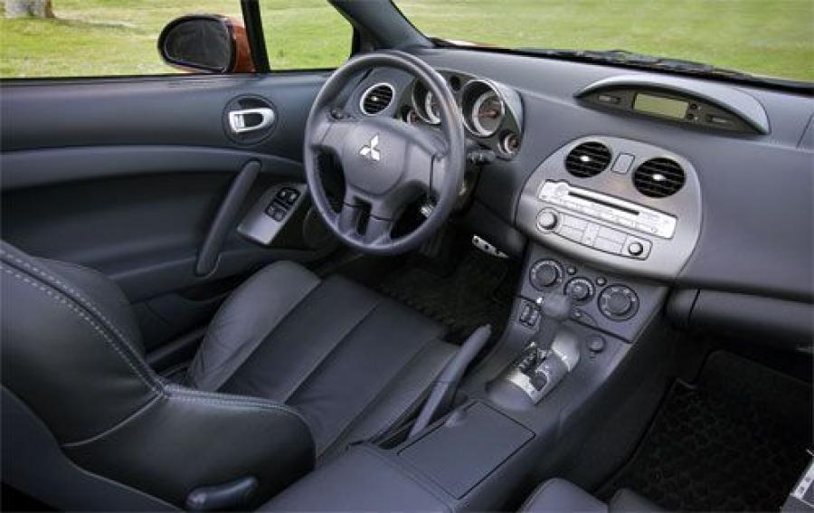  Mitsubishi Eclipse 2009 года  (фото 16 из 205)